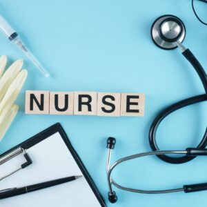 Medical tools and scrabble letters spelling 'NURSE' on a blue background.